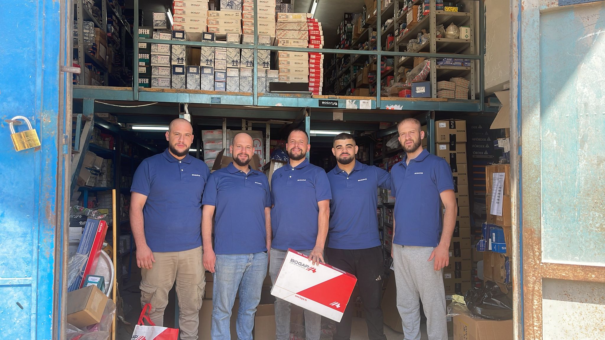 AIK Auto team at the warehouse
